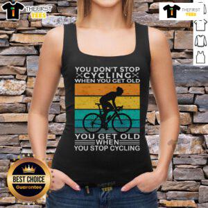 Vintage tank top featuring 'You Don't Stop Cycling When You Get Old' graphic, perfect for cycling enthusiasts of all ages.