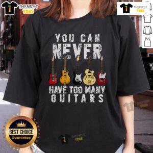 Stylish 'Nice You Can Never Have Too Many Guitars' tee for music-loving ladies, featuring a guitar graphic and trendy design.