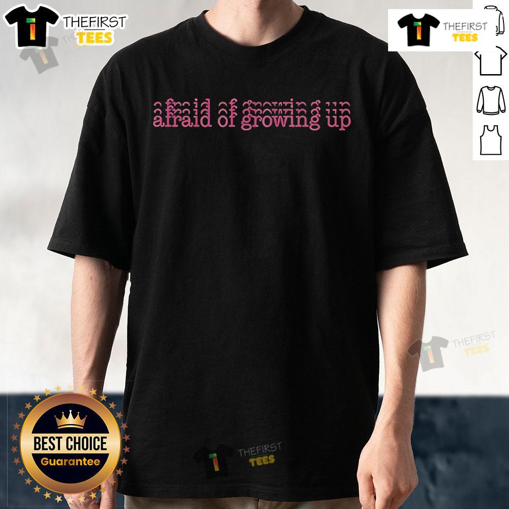 Official Lil Tay Afraid Of Growing Up T-Shirt featuring vibrant graphics and bold lettering, perfect for fans of Lil Tay.