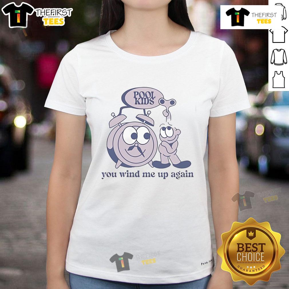 Kids playing in a pool wearing 'You Wind Me Up Again' ladies tee, showcasing fun summer vibes and playful energy.