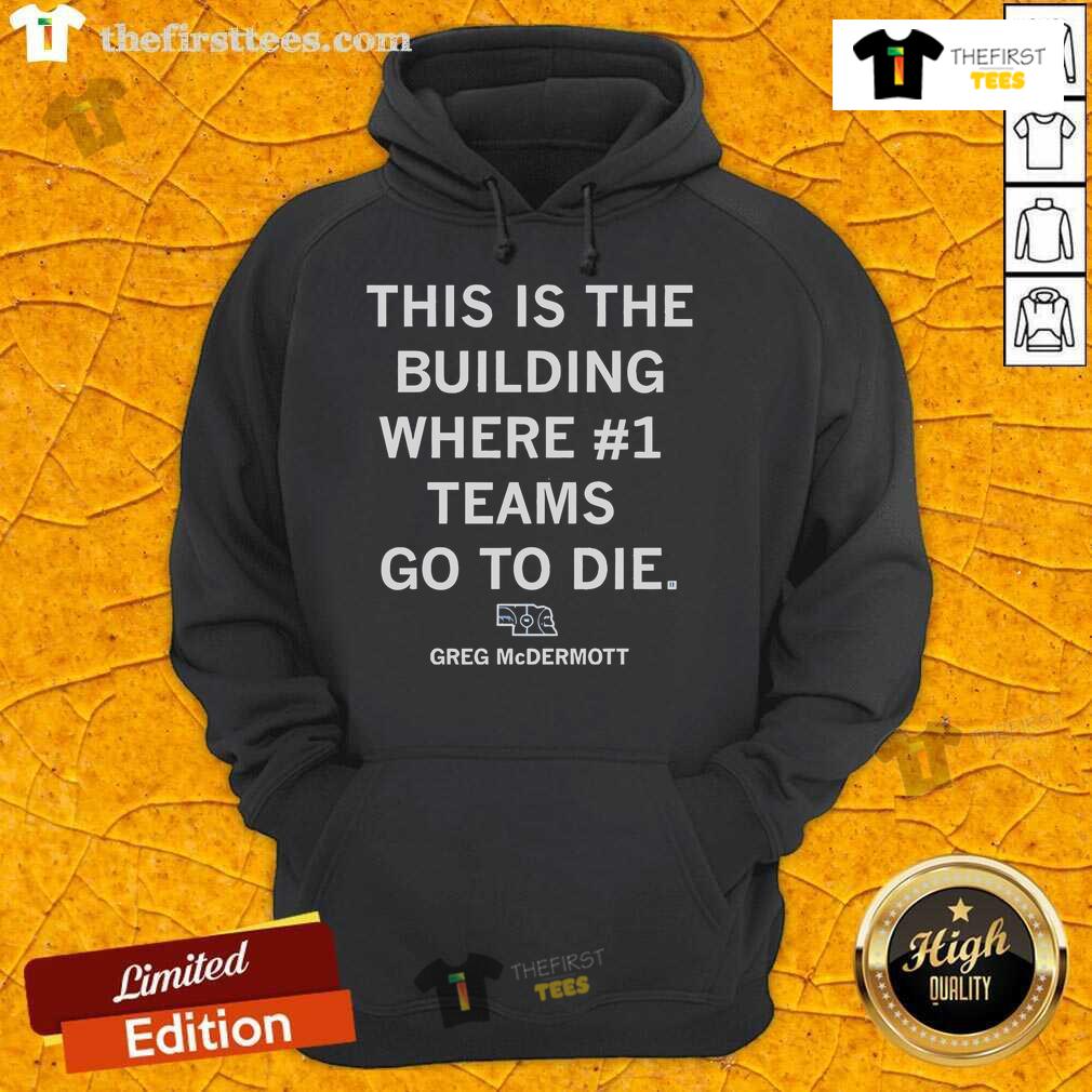 Greg McDermott hoodie in front of the iconic building where number one teams go to die, showcasing team spirit.