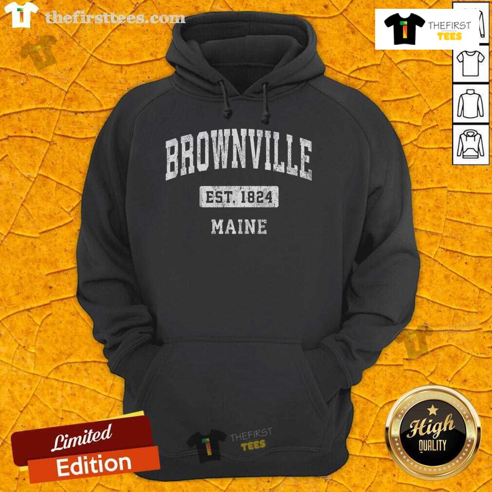 Premium Brownville Maine Vintage Sports Established Hoodie in a cozy setting, showcasing stylish design and classic appeal.