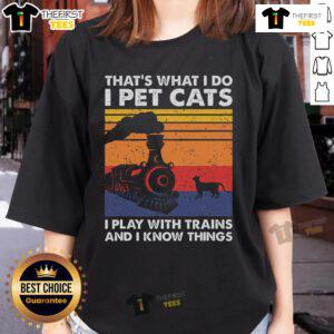 Premium 'That's What I Do I Pet Cats I Play With Trains' Model Train Ladies Tee featuring a playful cat and train design.