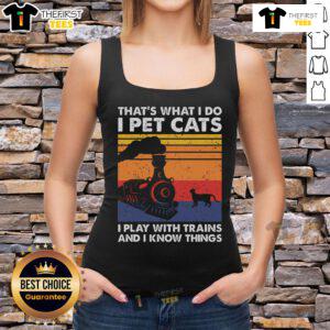 Premium tank top featuring 'That's What I Do I Pet Cats & Play With Trains' design for cat and model train enthusiasts.