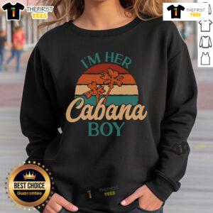 Casual 'I'm Her Cabana Boy' sweatshirt worn by a beach bartender at a vibrant seaside cabana.