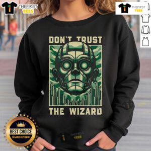Alt Text: Cozy 'Don't Trust The Wizard' sweatshirt featuring a whimsical graphic, perfect for casual wear and wizard fans.