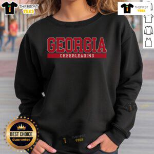 Top Georgia cheerleading sweatshirt featuring vibrant team colors and logo, perfect for fans and cheerleaders alike.
