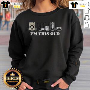 Retro sweatshirt featuring a vintage VHS tape and floppy disk design, perfect for nostalgic tech lovers.