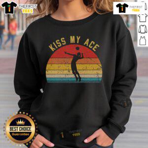 Retro vintage sweatshirt featuring 'Kiss My Ace' volleyball player design with sunset background.