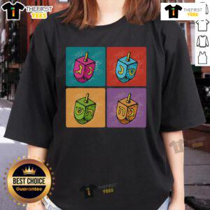 Funny Hanukkah Dreidel Pop Art Ladies Tee featuring vibrant colors and a playful dreidel design, perfect for holiday celebrations.