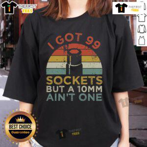 Funny mechanic ladies tee: 'I got 99 sockets but a 10mm ain't one' graphic design for car enthusiasts.