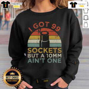 Funny mechanic sweatshirt featuring 'I got 99 sockets but a 10mm ain't one' design, perfect for automotive enthusiasts.