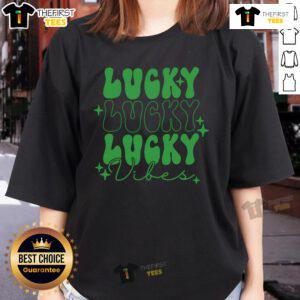Nice green Lucky Vibes ladies tee featuring a stylish design perfect for casual wear and expressing positivity.