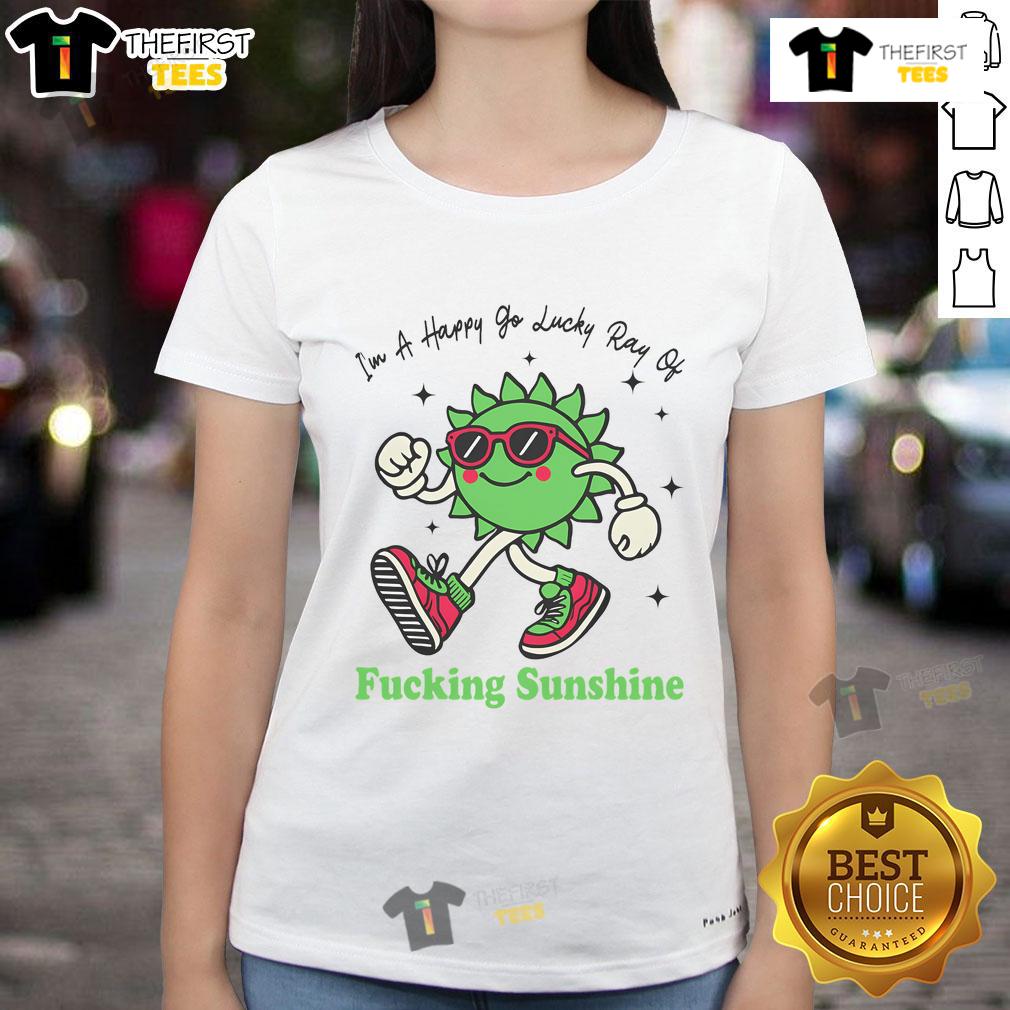 Happy-go-lucky lady wearing sunglasses and a cheerful graphic tee, showcasing fun style and positivity.