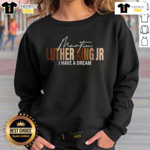 Top Martin Luther King Jr. I Have A Dream sweatshirt featuring iconic quote and vibrant design for inspirational fashion.