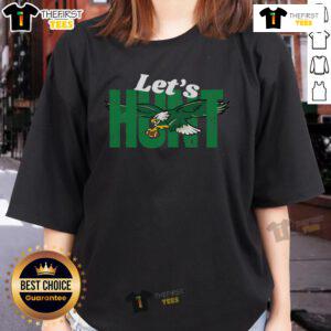 Top Vintage Let's Hunt Eagles Saying Ladies Tee featuring a stylish design for eagle enthusiasts and vintage fashion lovers.
