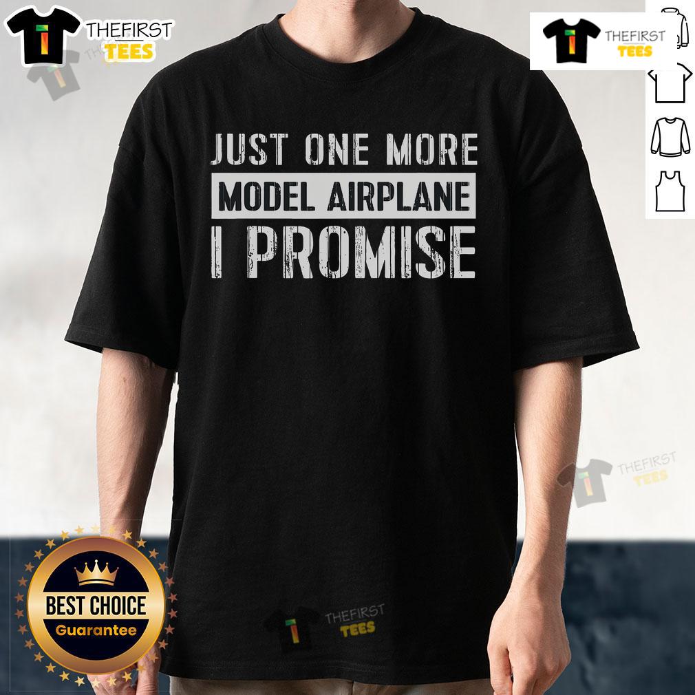 Nice model airplane hobby model builder wearing a T-shirt featuring aircraft designs, showcasing passion for aviation.
