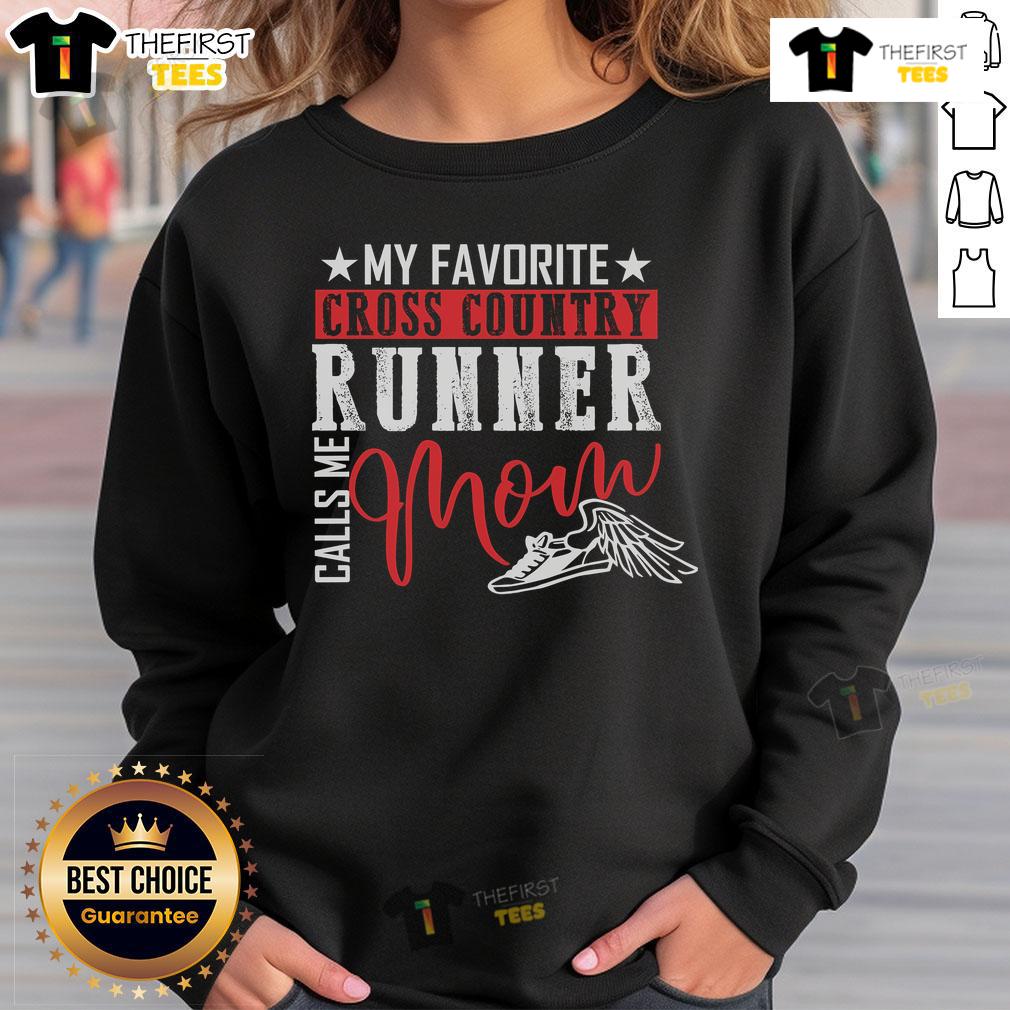 Mom wearing 'My Favorite Cross Country Runner Calls Me Mom' sweatshirt while jogging outdoors, showcasing sporty style.