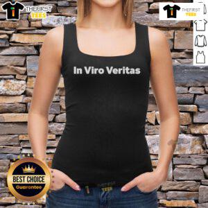 Alt Text: Toomas Hendrik Ilves wearing a Viro Veritas tank top, showcasing Estonian pride at a public event.