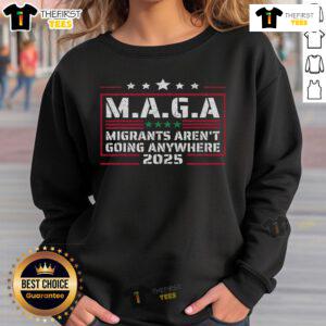 Premium MAGA Migrants Aren't Going Anywhere 2025 Sweatshirt featuring bold text design on a cozy, stylish fabric.