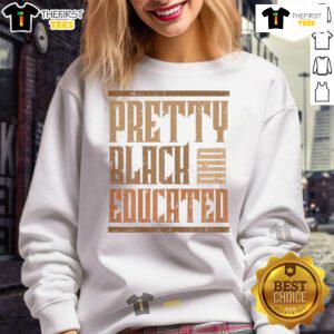 Pretty educated African girl wearing a sweatshirt celebrating Black History with melanin-rich skin tone.