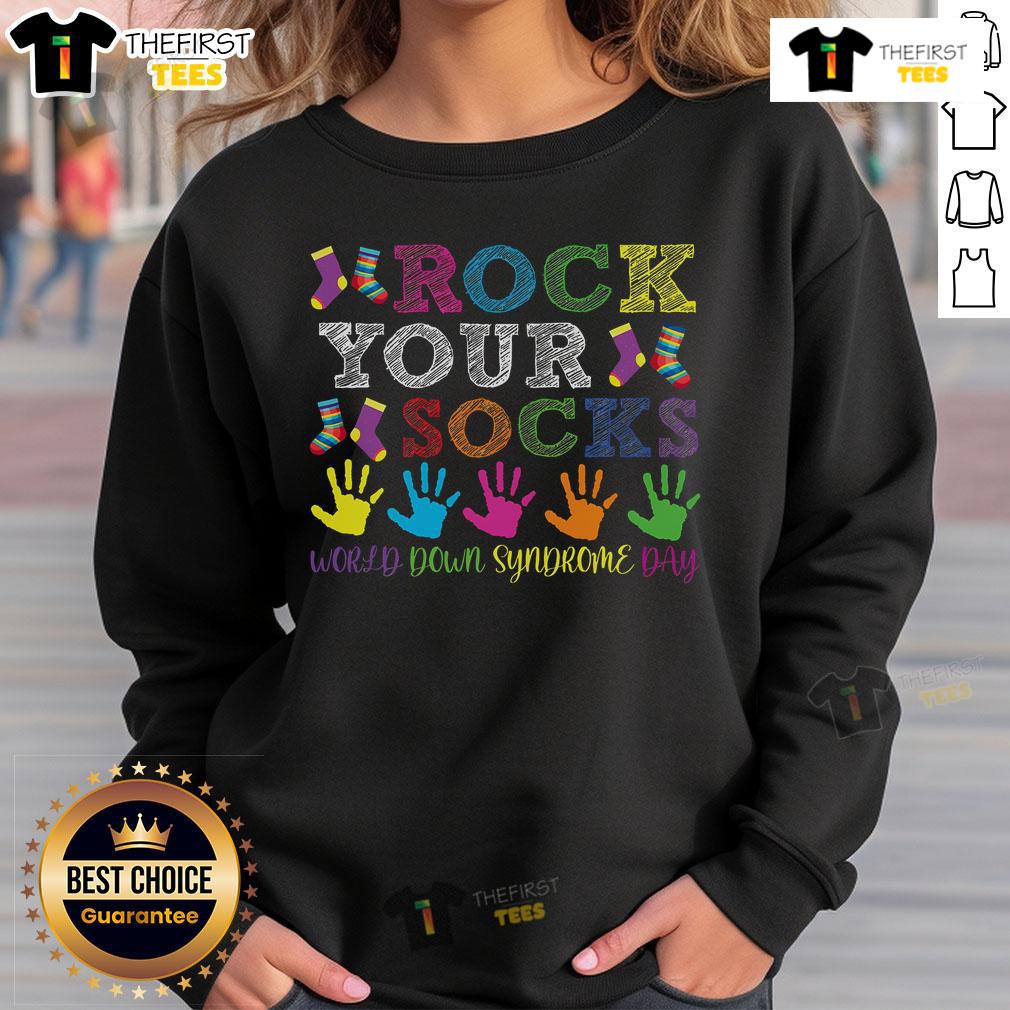Alt Text: Support Down Syndrome Day with a stylish sweatshirt featuring colorful socks, promoting awareness and inclusivity.