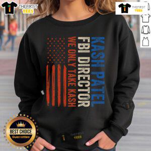 Vintage sweatshirt featuring Premium Kash Patel FBI Director design with American flag graphic, perfect for patriotic fans.