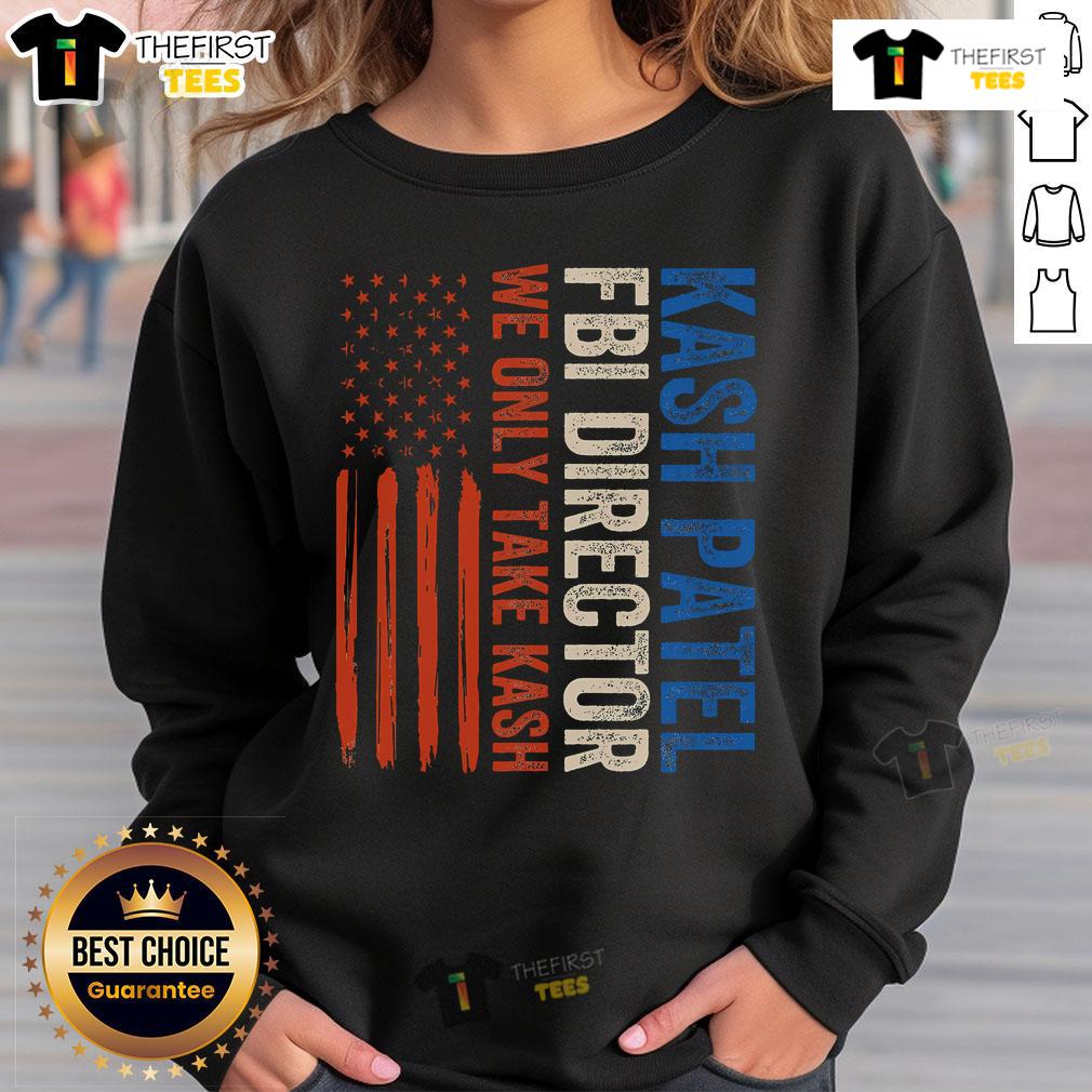 Vintage sweatshirt featuring Premium Kash Patel FBI Director design with American flag graphic, perfect for patriotic fans.