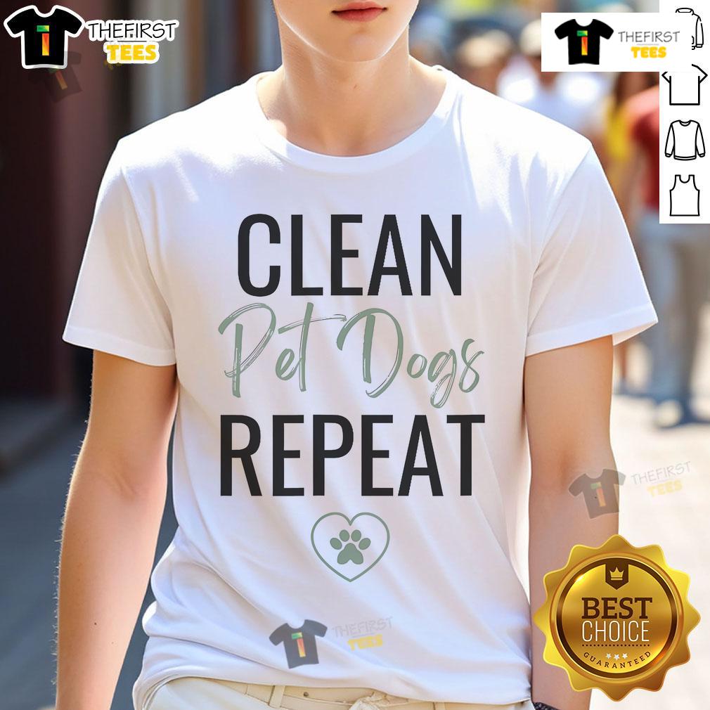 Nice cleaning lady wearing a dog lover t-shirt, promoting her cleaning business with a friendly smile.