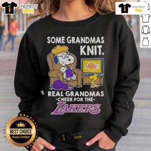 Alt Text: Snoopy and Woodstock in a cheerful design on a Los Angeles Lakers sweatshirt, perfect for grandmas.