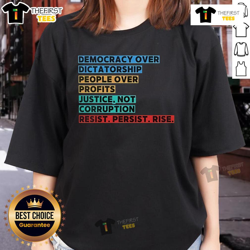 Top Democracy Over Dictatorship graphic on a ladies tee, promoting justice, people over profits, and resistance.