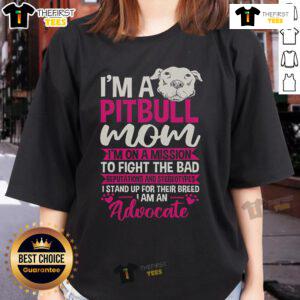 Pitbull mom in ladies tee promoting advocacy against stereotypes and bad reputations for pitbulls.