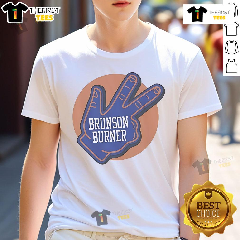 Alt Text: Official Brunson Burner New York Knicks T-Shirt featuring vibrant team colors and player graphics for fans.