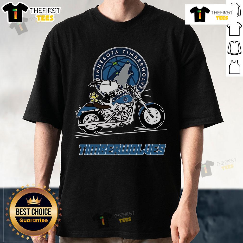 Alt Text: Official Snoopy and Woodstock driving motorbike on Minnesota Timberwolves T-Shirt, perfect for fans and collectors.