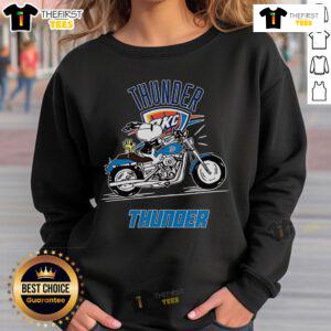 Official Snoopy and Woodstock driving a motorbike on Oklahoma City Thunder sweatshirt, vibrant team colors design.