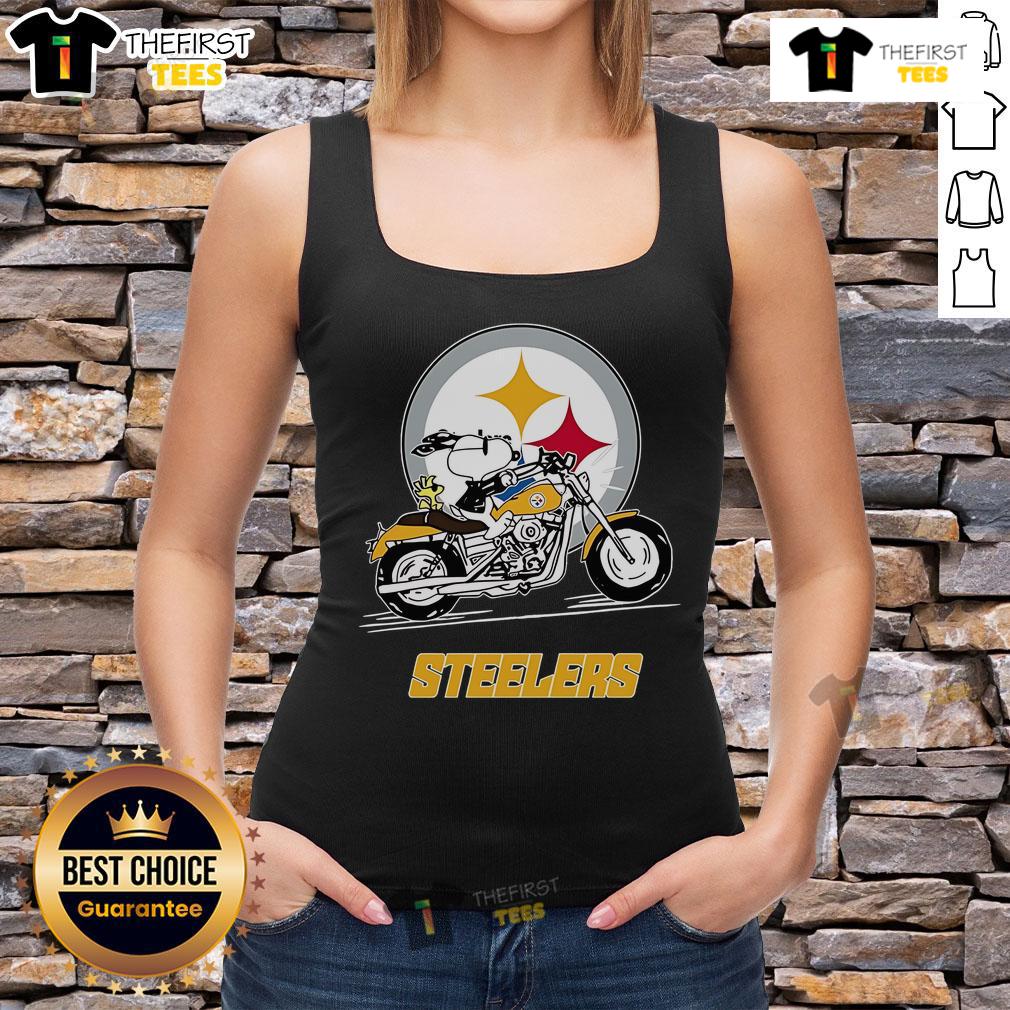 Alt Text: Snoopy and Woodstock riding a motorbike in a Pittsburgh Steelers tank top, showcasing fun sports-themed apparel.