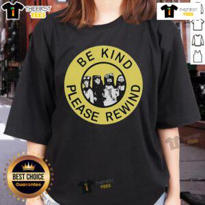 Alt Text: Top Be Kind Please Rewind Puppet Combo Ladies Tee featuring retro design and vibrant colors, perfect for casual wear.