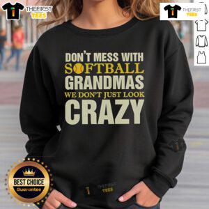 Cozy sweatshirt with 'Don't Mess With Softball Grandmas' design, perfect for proud softball grandmothers who love the game.