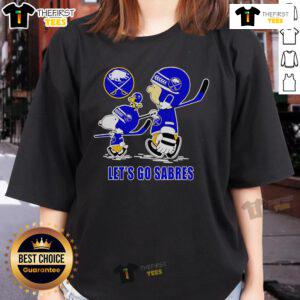 Top Peanuts Snoopy, Charlie Brown, and Woodstock on a Buffalo Sabres 'Let's Go Sabres' ladies tee shirt design.