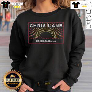 Cozy Nice Chris Lane North Carolina sunset sweatshirt displayed against a vibrant sunset backdrop, perfect for fans.