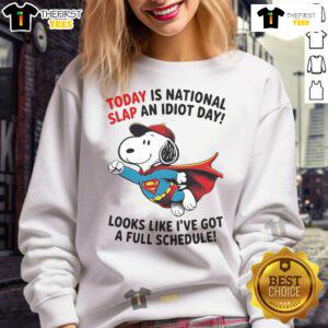 Cozy sweatshirt featuring Snoopy as Superman for National Slap An Idiot Day, perfect for a fun and humorous look.