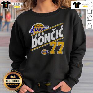 Vintage Luka Doncic Los Angeles Lakers sweatshirt featuring player number 77, perfect for basketball fans and collectors.