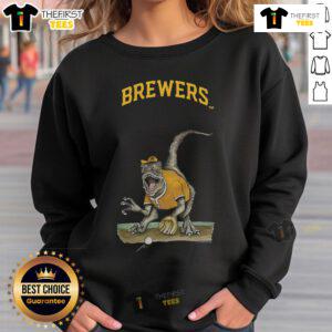 Alt Text: Official Milwaukee Brewers Tiny Turnip Velociraptor Sweatshirt featuring a playful dinosaur design for fans.