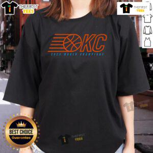 Alt Text: Official OKC 2025 World Champions Ball Ladies Tee, stylish women's shirt celebrating the championship victory.