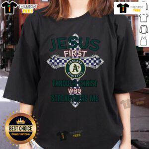 Original Oakland Athletics Jesus 'First Through Christ Who Strengthens Me' Ladies Tee showcasing team spirit and faith.