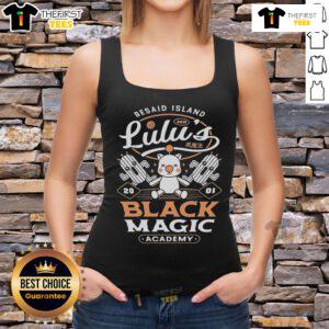 Pretty Besaid Island Lulus Black Magic Academy tank top displayed on a model against a tropical backdrop.