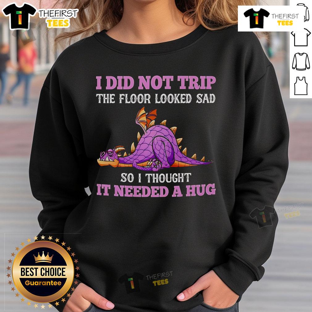 Alt Text: Cozy sweatshirt featuring a cute dragon design with the phrase I Did Not Trip, The Floor Looked Sad for whimsical style.