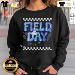 Blue team competition sweatshirt worn during a fun field day trip, showcasing vibrant colors and team spirit.