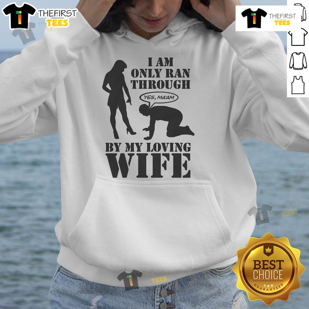 Comfortable hoodie with 'I Am Only Ran Through By My Loving Wife' print, perfect for casual wear and gifts.