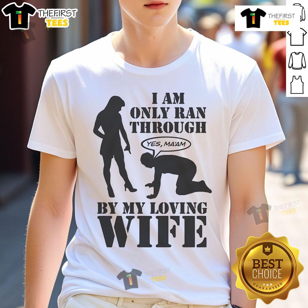 Alt Text: Top I Am Only Ran Through By My Loving Wife T-Shirt design featuring playful text and casual style for couples.
